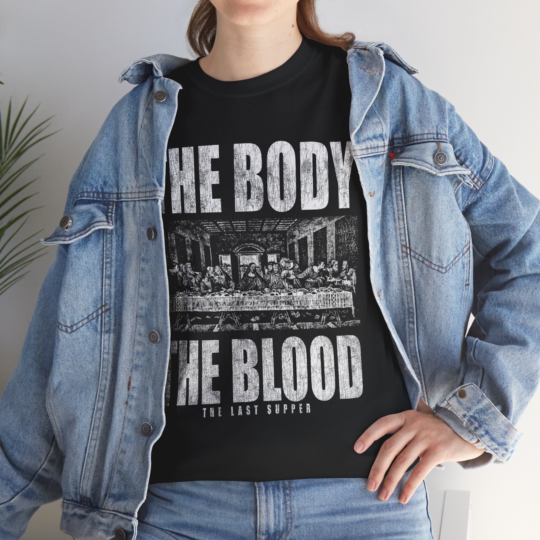Last Supper Christian tee with bold “The Body, The Blood” text – faith-based streetwear on model